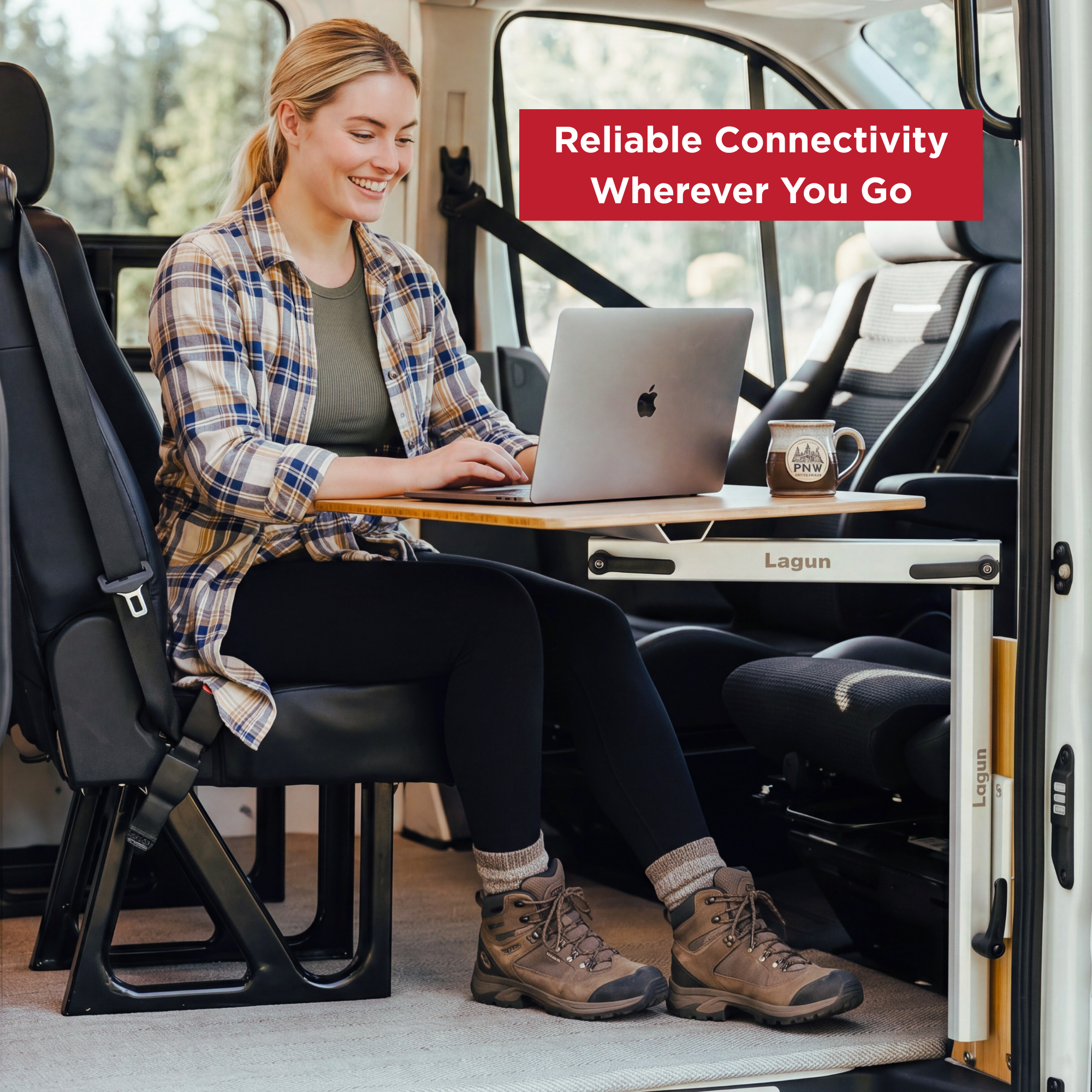 Woman using a laptop in a van with Reliable Connectivity Wherever You Go